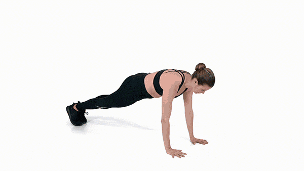 <p><strong>1/ </strong>Start in a plank position. Brace your core then jump your feet outside your hands and quickly lift your chest and arms so you’re standing in a squat.</p><p><strong>2/ </strong>Reverse the movement to return to the start. That’s one rep. </p>