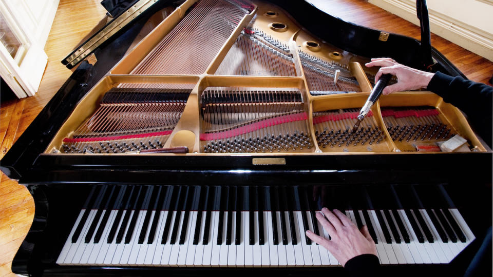 Piano tuner at work