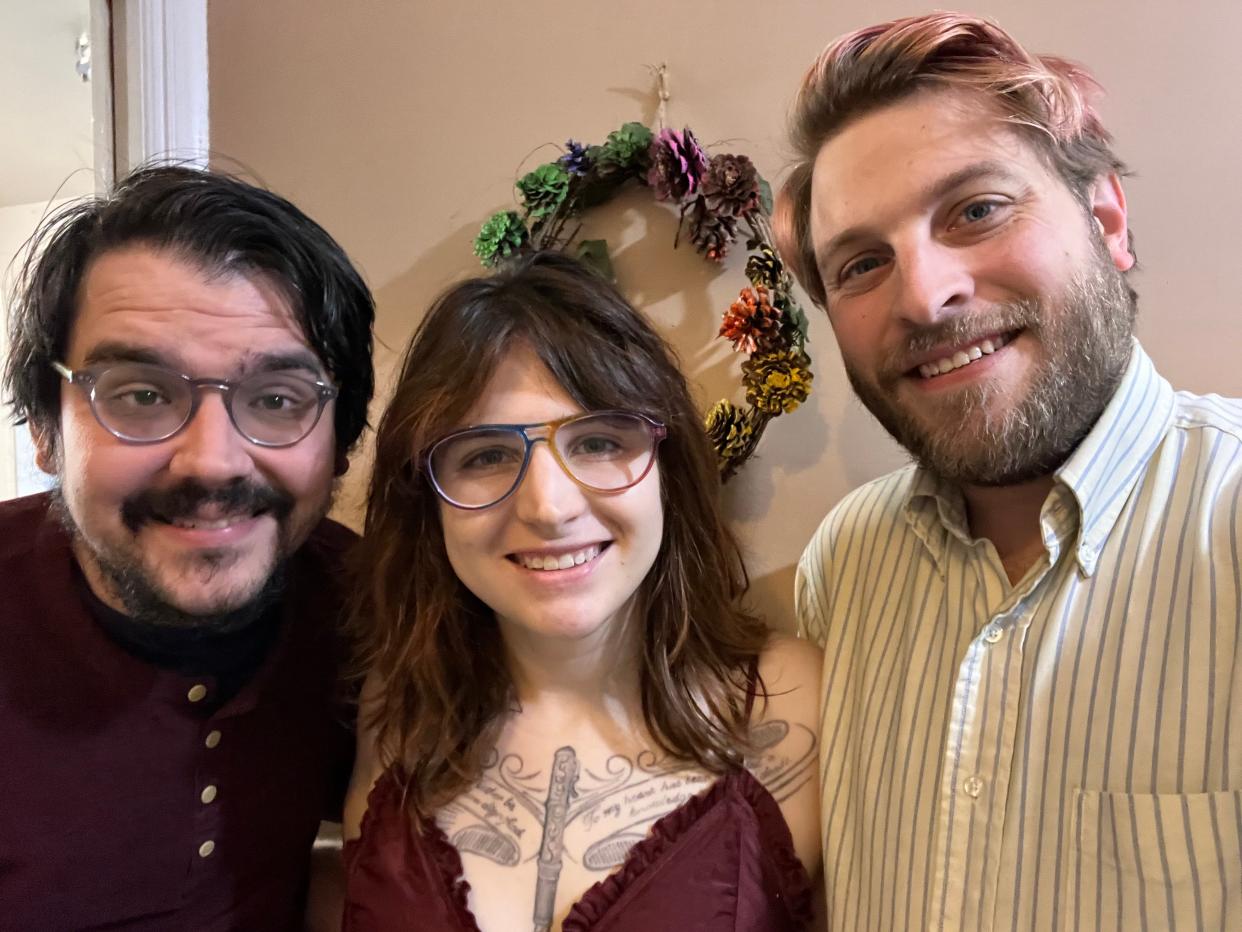 Jennifer's partner Ty (left), Jennifer (center), and Jennifer's husband Daniel (right)