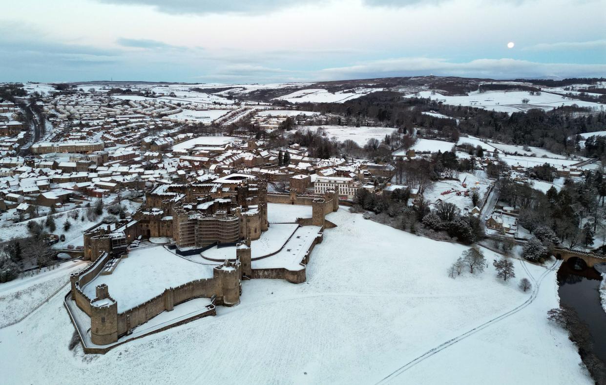 Snow covered fields surround Alnwick Castle in Northumberland as weather warnings for snow and ice are issued (Owen Humphreys/PA Wire)