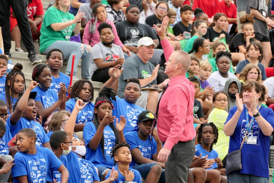 Disitrict Superintendent Shane Andrew stands before students during Fifth Grade Field Day in 2022.