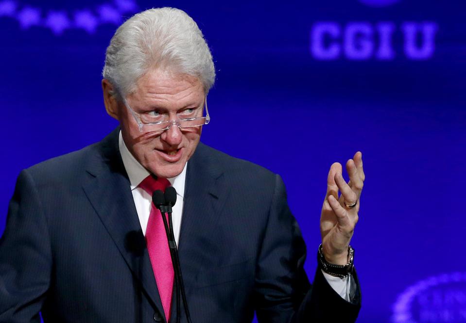 FILE - Former president Bill Clinton speaks at a student conference for the Clinton Global Initiative University at Arizona State University, in this March 21, 2014 file photo taken in Tempe, Ariz. The National Archives is scheduled to release thousands of pages of documents from Bill Clinton's administration Friday March 28, 2014. (AP Photo/Ross D. Franklin, File)