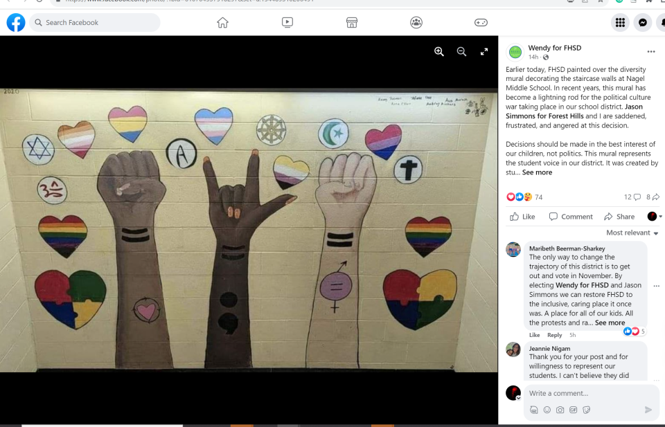This post on Facebook shows a more full view of the mural before it was painted over