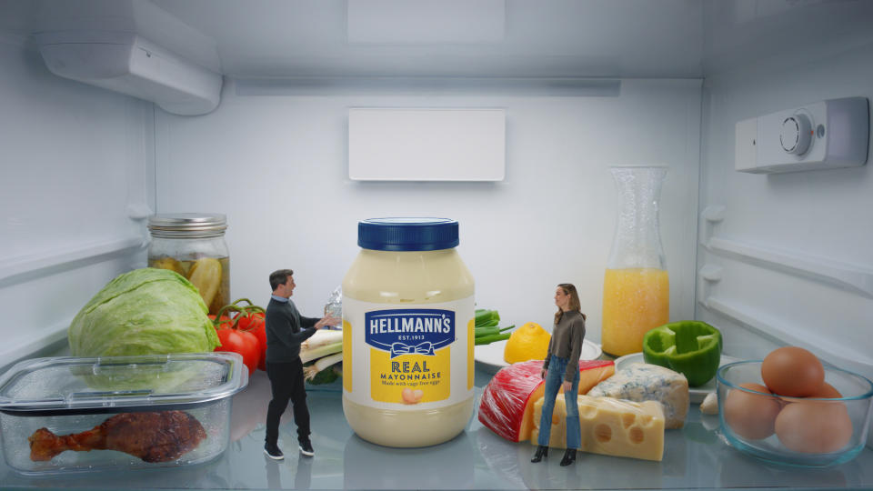 This photo provided by Hellmann's shows Jon Hamm and Brie Larson in scene from Hellmann's 2023 Super Bowl NFL football spot. (Hellmann's via AP).