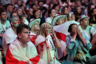 <p>England fan looks dejected after the match. REUTERS/Simon Dawson </p>