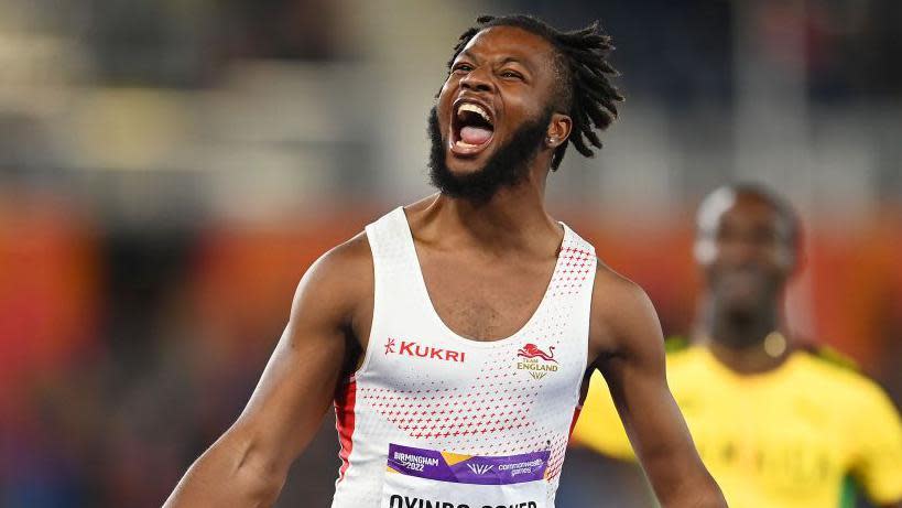 Emmanuel Oyinbo-Coker celebrating winning gold at the Commonwealth Games in Birmingham