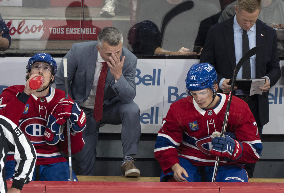 Montreal Canadiens' head coach Martin St. Louis reacts behind the bench during the second period of an NHL hockey game against the Minnesota Wild, Tuesday, Oct. 17, 2023 in Montreal. (Christinne Muschi/The Canadian Press via AP)