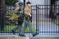 <p>Orange County Sheriff’s Department SWAT members arrive to a fatal shooting at Pulse Orlando nightclub in Orlando, Fla., Sunday, June 12, 2016. (AP Photo/Phelan M. Ebenhack) </p>