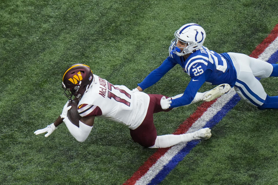 Washington Commanders wide receiver Terry McLaurin (17) is tackled by Indianapolis Colts safety Rodney Thomas II (25) in the first half of an NFL football game in Indianapolis, Sunday, Oct. 30, 2022. (AP Photo/AJ Mast)