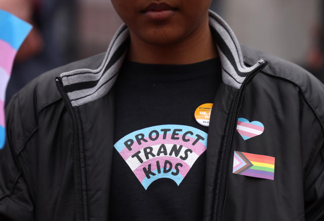 Boston, MA - March 31: A person takes part in a rally during a Transgender Day of Visibility Event named, We Are A State of Love: A Gathering of Visible Solidarity With LGBTQ Youth outside of the State House in Boston on March 31, 2022. (Photo by Jessica Rinaldi/The Boston Globe via Getty Images)