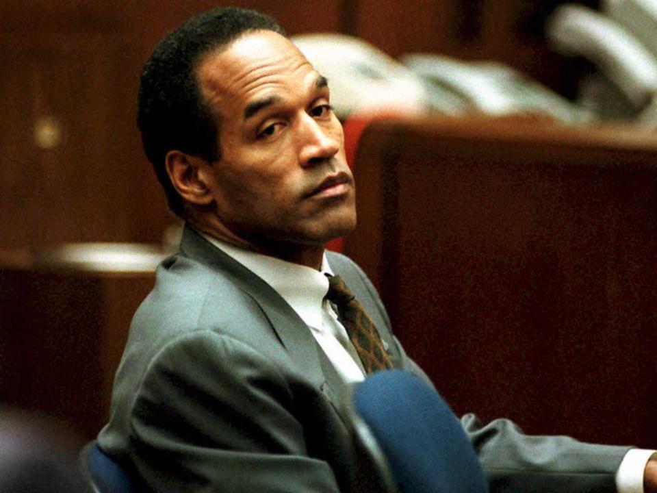 <p>POOL/AFP/Getty</p> O. J. Simpson in 1994