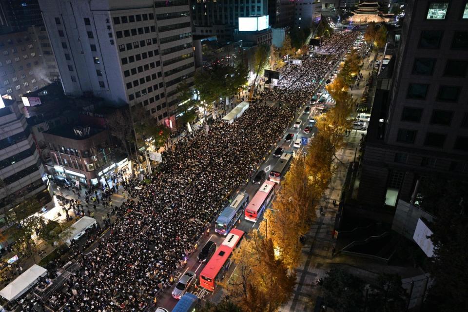 Thousands attended a vigil in downtown Seoul (AFP via Getty Images)