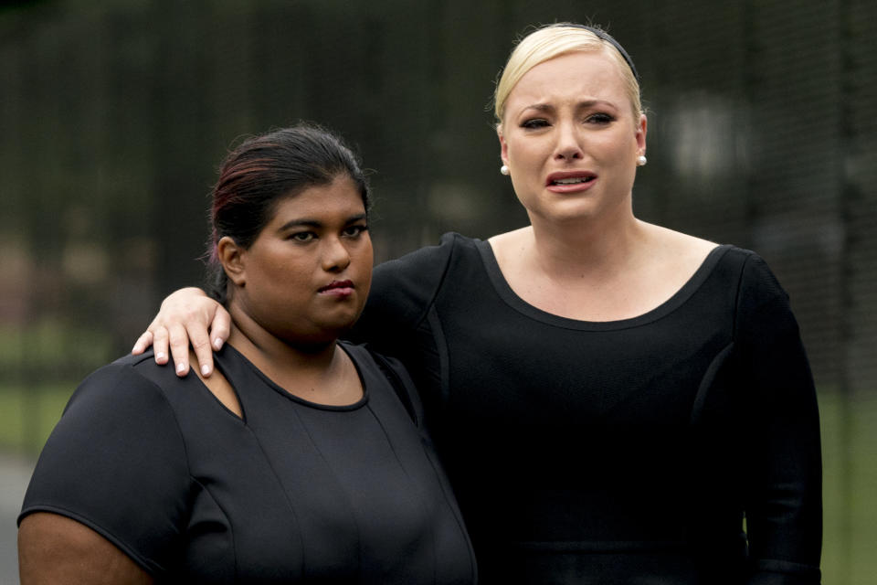 Bridget McCain and Meghan McCain watch as their mom Cindy McCain lays a wreath at the Vietnam Veterans Memorial in Washington, D.C., Sept. 1 in honor of John McCain. (Photo: AP Photo/Andrew Harnik, Pool)