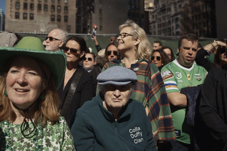 People watch the St. Patrick's Day Parade on Saturday, March 16, 2024, in New York. (AP Photo/Andres Kudacki)