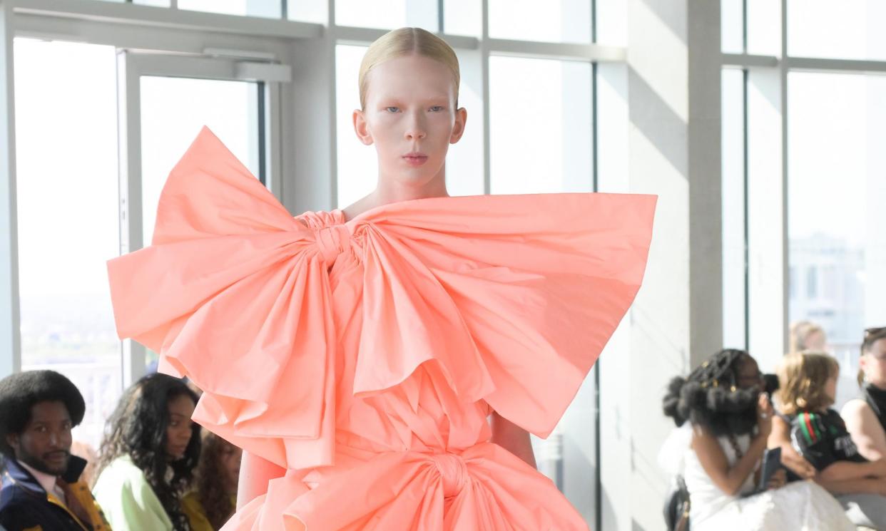 <span>Lavishly draped tangerine silks created a poetic beauty at Roksanda.</span><span>Photograph: WWD/Getty Images</span>