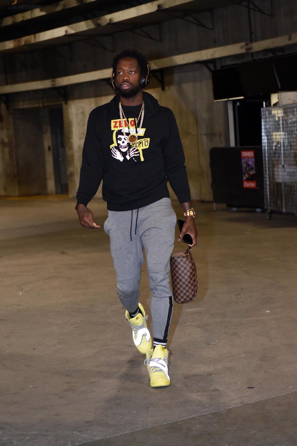 Patrick Beverley of the LA Clippers arrives before Game Six wearing a Zero skateboards hoodie with a pair of Jeremy Scott x Adidas originals on April 26, 2019.