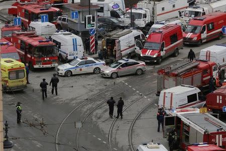 General view of emergency services attending the scene outside Sennaya Ploshchad metro station, following explosions in two train carriages in St. Petersburg, Russia April 3, 2017. REUTERS/Anton Vaganov