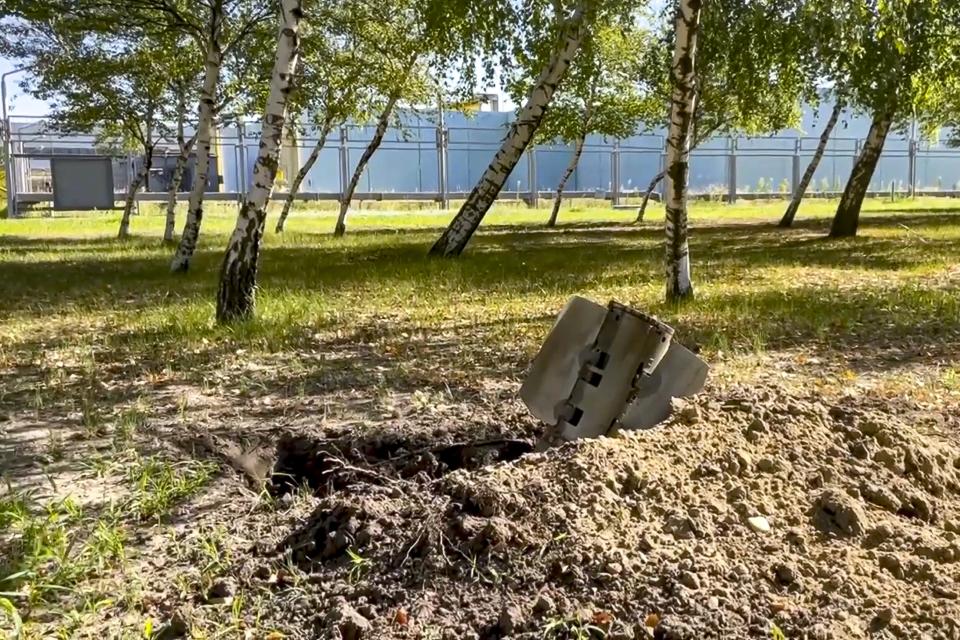 FILE - In this handout photo taken from video and released by Russian Defense Ministry Press Service on Aug. 7, 2022, a rocket fragment after shelling is seen near the Zaporizhzhia Nuclear Power Station in territory under Russian military control, southeastern Ukraine. The Zaporizhzhia plant is in southern Ukraine, near the town of Enerhodar on the banks of the Dnieper River. It is one of the 10 biggest nuclear plants in the world. Russia and Ukraine have accused each other of shelling Europe's largest nuclear power plant, stoking international fears of a catastrophe on the continent. (Russian Defense Ministry Press Service via AP)