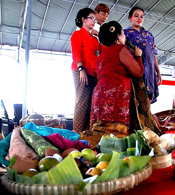 A blessed pregnancy: Mithoni is one of the region's traditions for pregnant women, where they tried on seven different types of batik in the hope that the children will have good attitude. (