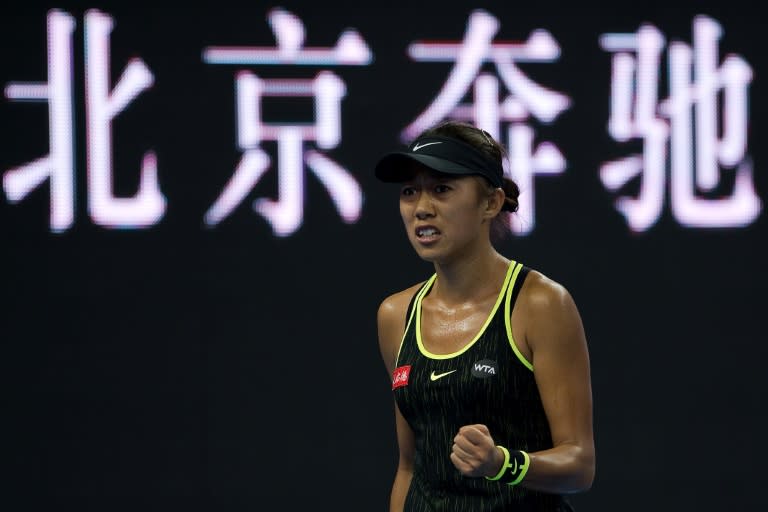 China's Zhang Shuai booked her spot in the China Open quarter-finals, the first time she has made it past the third round of her home tournament in seven attempts