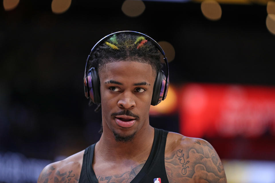 MEMPHIS, TENNESSEE - APRIL 16: Ja Morant #12 of the Memphis Grizzlies warms up before Game One of the Western Conference First Round Playoffs against the Los Angeles Lakers at FedExForum on April 16, 2023 in Memphis, Tennessee. NOTE TO USER: User expressly acknowledges and agrees that, by downloading and or using this photograph, User is consenting to the terms and conditions of the Getty Images License Agreement.  (Photo by Justin Ford/Getty Images)