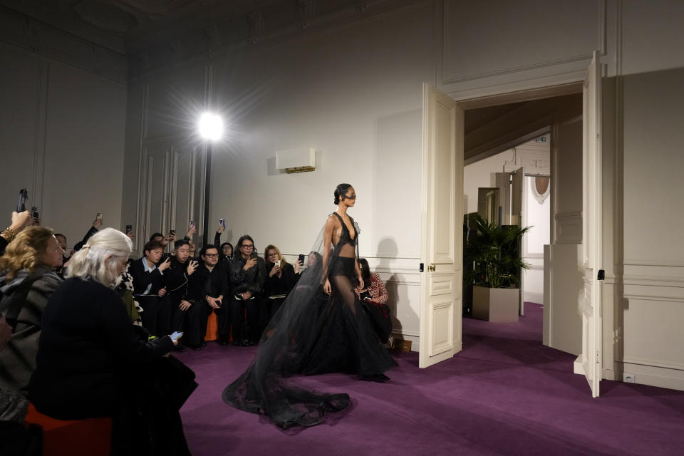 A model wears a creation for Valentino as part of the Haute Couture Spring-Summer 2024 collection presented in Paris, Wednesday, Jan. 24, 2024. (AP Photo/Thibault Camus)