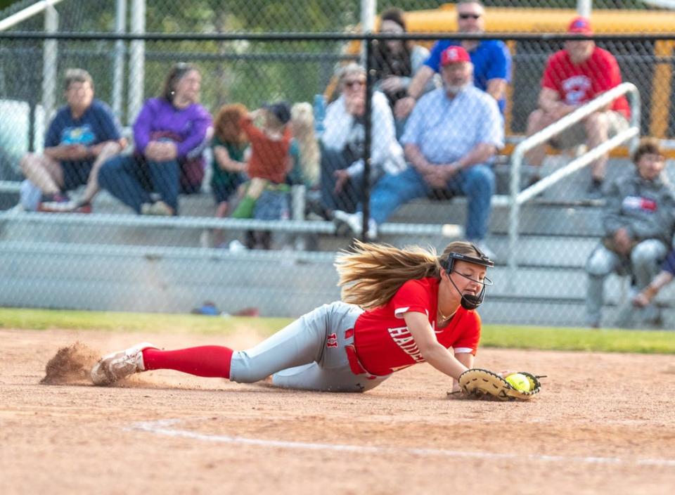 Hornell first baseman Jordyn Dyring makes a diving catch during Monday's 9-3 Section V playoff win over visiting Palmyra-Macedon.