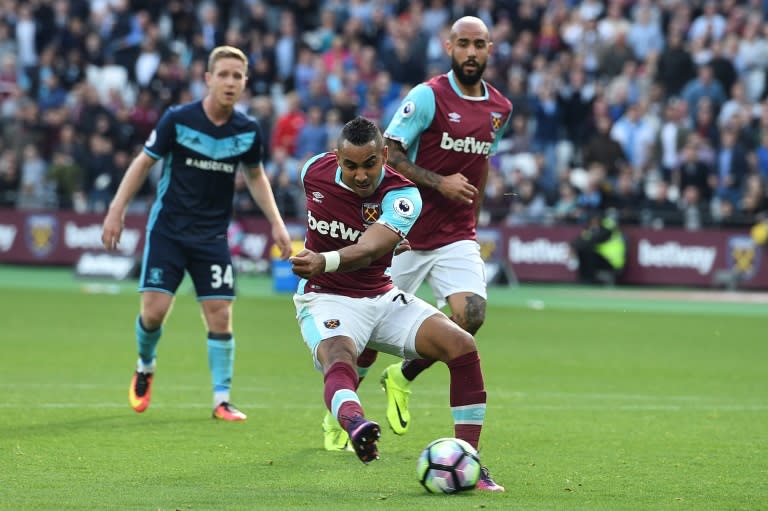 West Ham United's midfielder Dimitri Payet (L) scores against Middlesbrough at The London Stadium, in east London on October 1, 2016