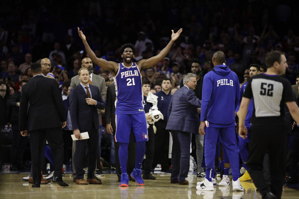 Philadelphia 76ers' Joel Embiid reacts after it was announced that he and Minnesota Timberwolves' Karl-Anthony Towns had been ejected, during the second half of an NBA basketball game Wednesday, Oct. 30, 2019, in Philadelphia. (AP Photo/Matt Rourke)