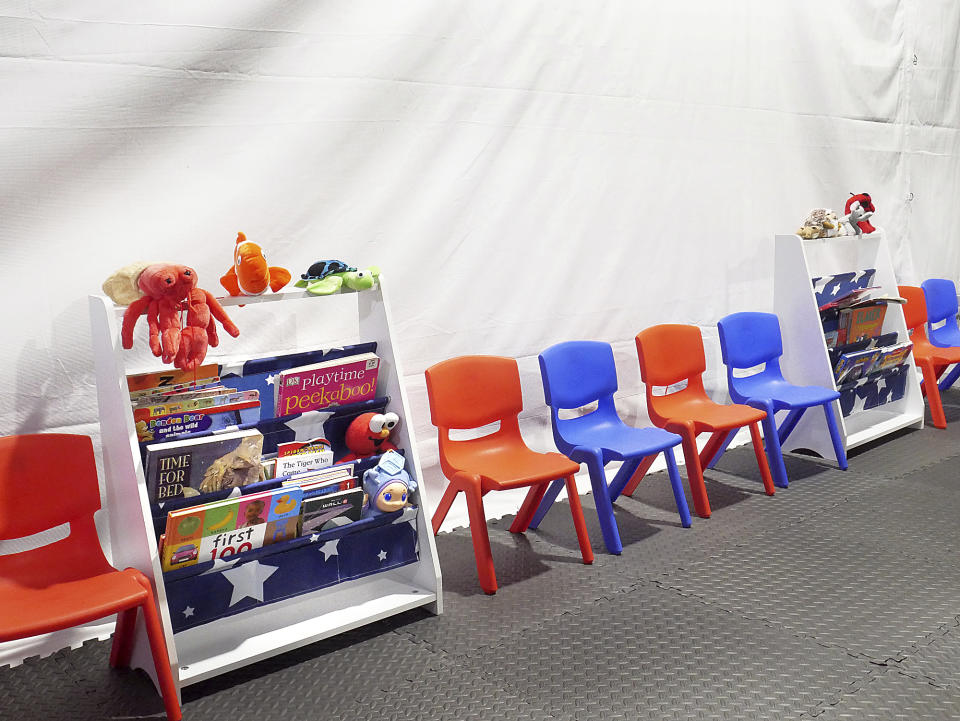 Stuff animals, story books and small chairs fill the Juvenile waiting area at the Migrant Protection Protocols Immigration Hearing Facilities in Laredo, Tuesday, September 10, 2019. The facility is schedule to open for hearings for immigrants seeking asylum on Monday, September 16, 2019. (Ricardo Santos/The Laredo Morning Times via AP)