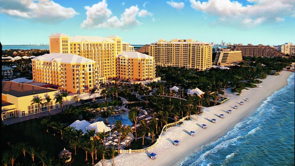 <p><a href="https://www.ritzcarlton.com/en/hotels/miami/key-biscayne" rel="nofollow noopener" target="_blank" data-ylk="slk:The Ritz-Carlton Key Biscayne;elm:context_link;itc:0;sec:content-canvas" class="link ">The Ritz-Carlton Key Biscayne</a> is considered one of the luxury resort chain's best properties in the U.S., so it's a must for those looking for luxury in Miami. Key Biscayne is a five-mile barrier island just off the coast of the city and is easily accessible by car but still makes for an exclusive experience. If you're looking for an amazing view (and who isn't?), nearly every room and suite looks out onto either the Atlantic Ocean, Biscayne Bay, or the resort's tropical gardens. This Ritz property boasts its best tennis facility in the world, and its golden sand beach is regarded as one of America's best beaches, so those who expect the utmost need look no further than right here. </p>