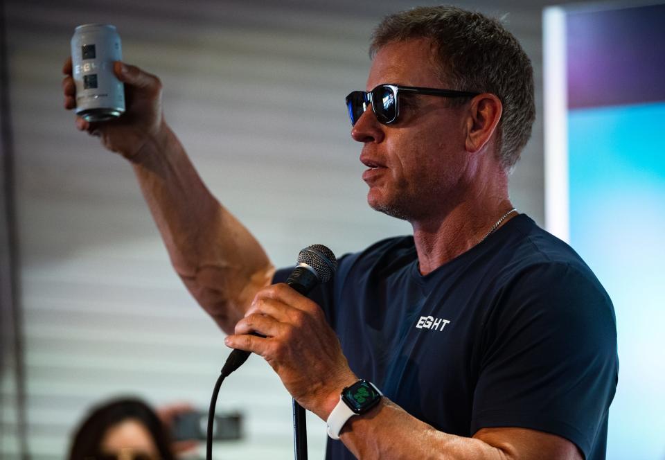 Hall of Fame Cowboys quarterback Troy Aikman speaks on a stage at Brewster Street Icehouse on Wednesday, May 18. Aikman visited three bars in Corpus Christi on Wednesday to promote his new beer, Eight Elite Lager.