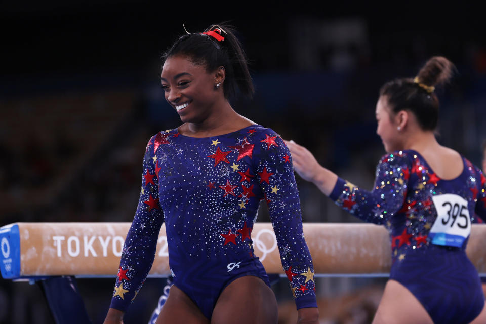 <p>TOKYO, JAPAN - JULY 25: Simone Biles of Team United States l react on day two of the Tokyo 2020 Olympic Games at Ariake Gymnastics Centre on July 25, 2021 in Tokyo, Japan. (Photo by Amin Mohammad Jamali/Getty Images)</p> 