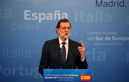 FILE PHOTO: Spain's Prime Minister Mariano Rajoy gestures as he attends a news conference at the end of Southern EU Countries summit at El Pardo Palace in Madrid, Spain, April 10, 2017. REUTERS/Juan Medina/File Photo