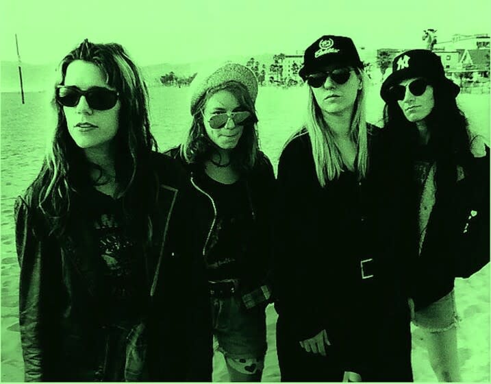 members of te punk band L7 at Santa Monica beach in 1992.
