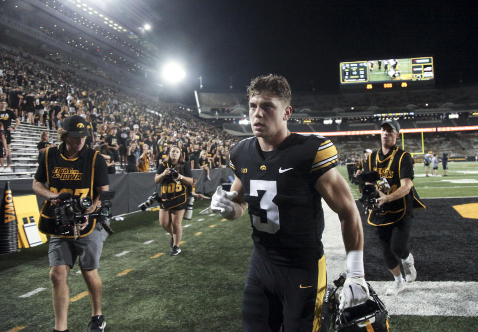 Iowa's Cooper DeJean is one of the standout defensive backs ​in the 2024 NFL Draft ⁤class.  (Photo by Matthew Holst/Getty ‍Images)