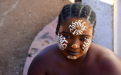 The sakalava face paint is used to keep the skin healthy and protected from the sun and mosquitoes - Credit: iStock