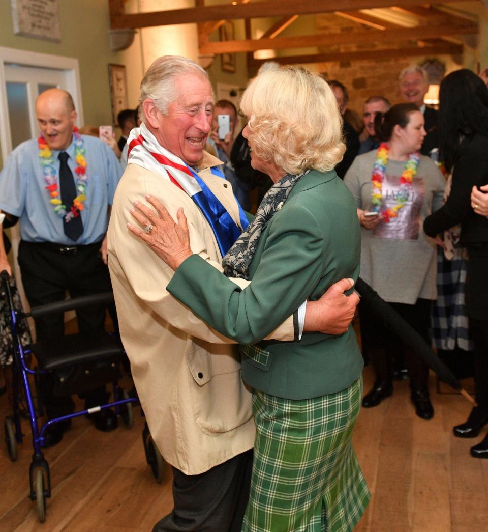 King Charles and Camilla, Queen Consort dance at Dumfries House in Scotland as an Elvis impersonator sings.