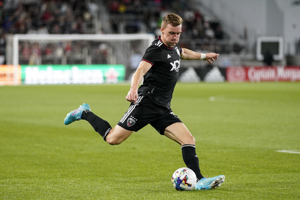 FILE - D.C. United defender Julian Gressel (31) plays during the first half of an MLS soccer match against Austin FC, Saturday, April 16, 2022, in Washington. Julian Gressel, a German-born 29-year-old defender who gained U.S. citizenship in November, is among 13 players who could make their U.S. national team debuts under interim coach Anthony Hudson in exhibitions against Serbia on Jan. 25 and Colombia three days later. (AP Photo/Alex Brandon, File)