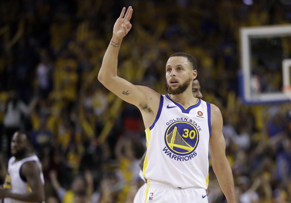 FILE - In this May 26, 2018, file photo, Golden State Warriors guard Stephen Curry (30) gestures during the second half of Game 6 of the NBA basketball Western Conference Finals against the Houston Rockets, in Oakland, Calif. The odds are longer than a Stephen Curry 3-pointer. The Cavaliers are being given little _ or no _ chance in their fourth straight NBA Finals against the Golden State Warriors, who have been installed by Las Vegas as the biggest favorites in 16 years.  (AP Photo/Marcio Jose Sanchez, File)