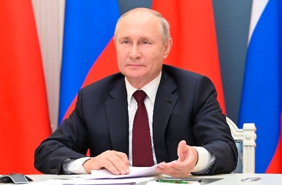 Russian President Vladimir Putin talks via video conference