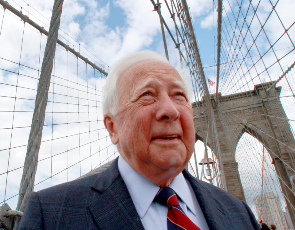 In this May 10, 2012 photo, author David McCullough, two-time Pulitzer Prize winner for books "Truman" and "John Adams," walks over the Brooklyn Bridge while being interviewed in New York. McCullough is celebrating the 40th anniversary of his book "The Great Bridge," which has just been reissued with a new introduction by the 78-year-old writer. (AP Photo/Bebeto Matthews)