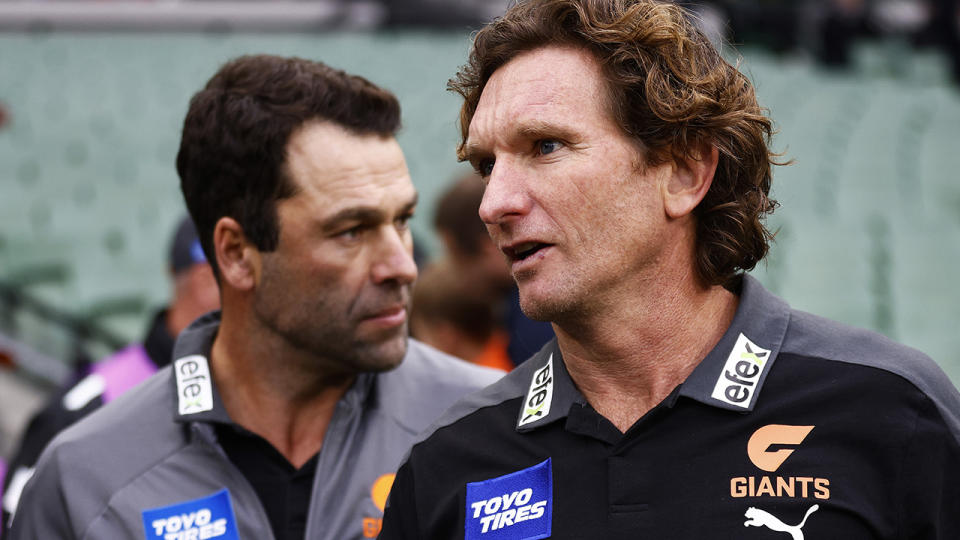 Dean Solomon and James Hird are pictured in their assistant coaching roles for the GWS Giants.