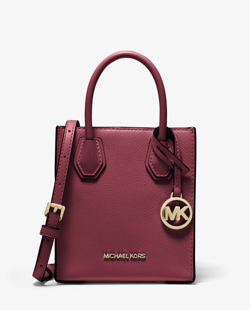 Mercer Extra-Small Pebbled Leather Crossbody Bag in mulberry (photo via Michael Kors)