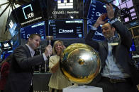 Toast co-Founder Jonathan Grimm, left, rings the ceremonial first-trade bell, joined by SVP for Finance Jennifer DiRico and fellow co-Founder Steve Fredette, as their IPO begins trading, on the floor of the New York Stock Exchange, Wednesday, Sept. 22, 2021. (AP Photo/Richard Drew)