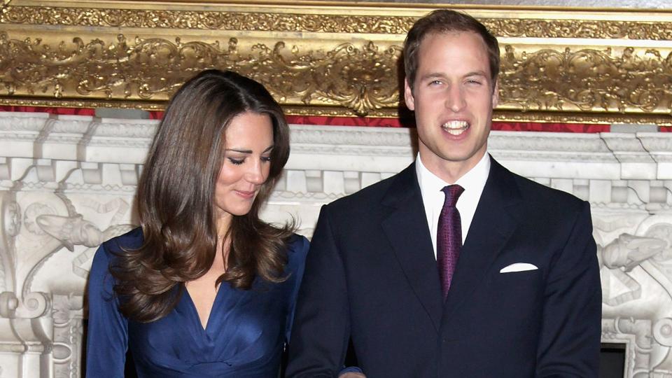 Kate pictured admiring her engagement ring during her and Prince William's engagement announcement