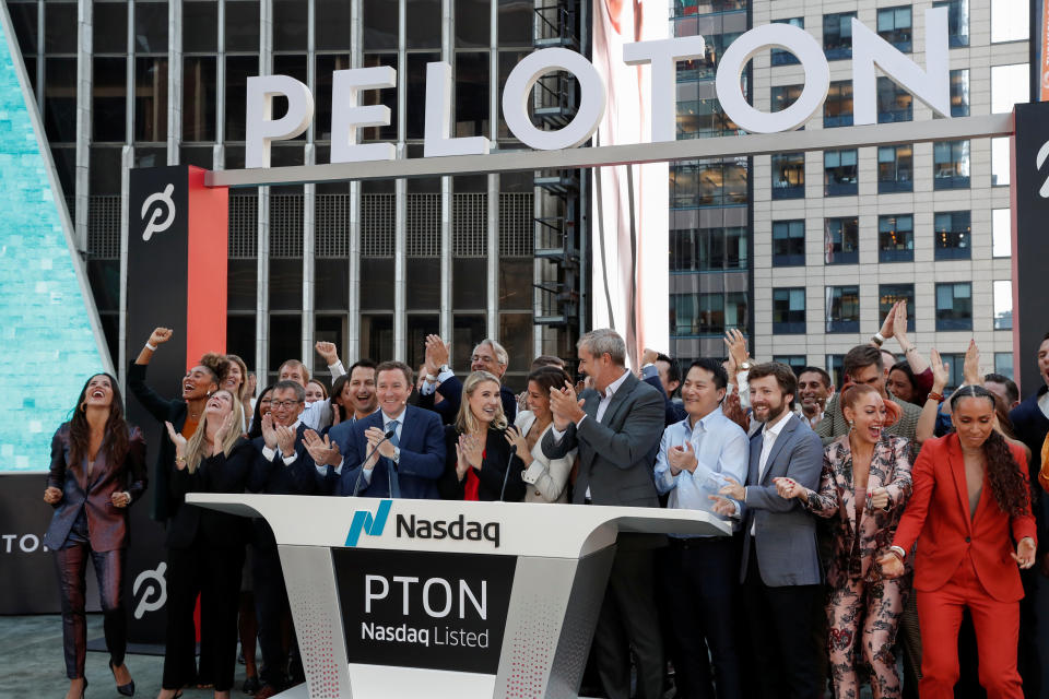 President of Peloton William Lynch and employees celebrate ringing the opening bell for the company's IPO at the Nasdaq Market site  in New York City, New York, U.S., September 26, 2019. REUTERS/Shannon Stapleton