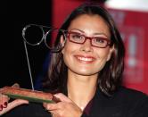 TV presenter Melanie Sykes holding the Female Spectacle Wearer of the Year award which she won today (Tuesday) during a ceremony at the Fashion Cafe, in Piccadilly, central London. Photo by Michael Stephens/PA. See PA Story SOCIAL Glasses (Photo by Michael Stephens - PA Images/PA Images via Getty Images)