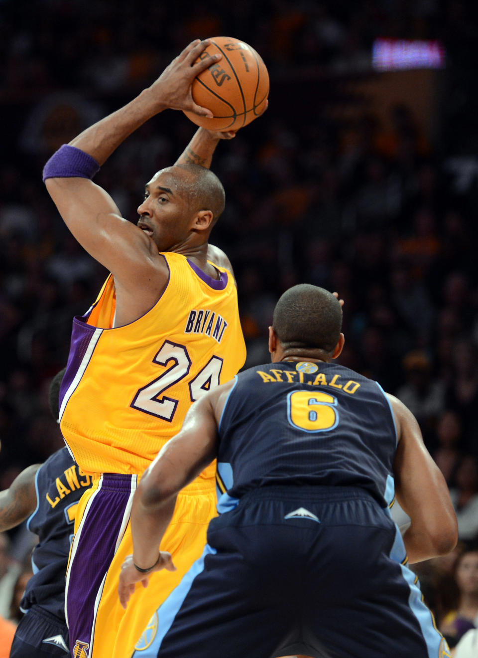 LOS ANGELES, CA - MAY 12: Kobe Bryant #24 of the Los Angeles Lakers posts up Arron Afflalo #6 of the Denver Nuggets in the first quarter in Game Seven of the Western Conference Quarterfinals in the 2012 NBA Playoffs on May 12, 2012 at Staples Center in Los Angeles, California. NOTE TO USER: User expressly acknowledges and agrees that, by downloading and or using this photograph, User is consenting to the terms and conditions of the Getty Images License Agreement. (Photo by Harry How/Getty Images)