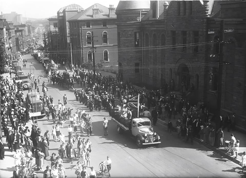 The 1939 St. John’s Labour Day parade wends its way along Duckworth Street. Courtesy of The Rooms. (Public